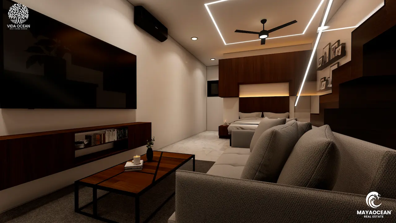 First floor loft living room in the foreground with sofa and wide tv