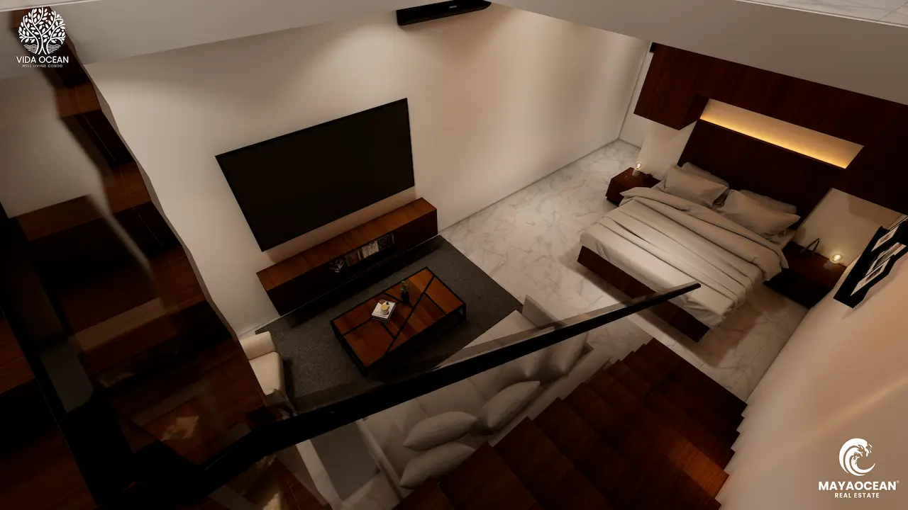 aerial view of first floor with bedroom and living room